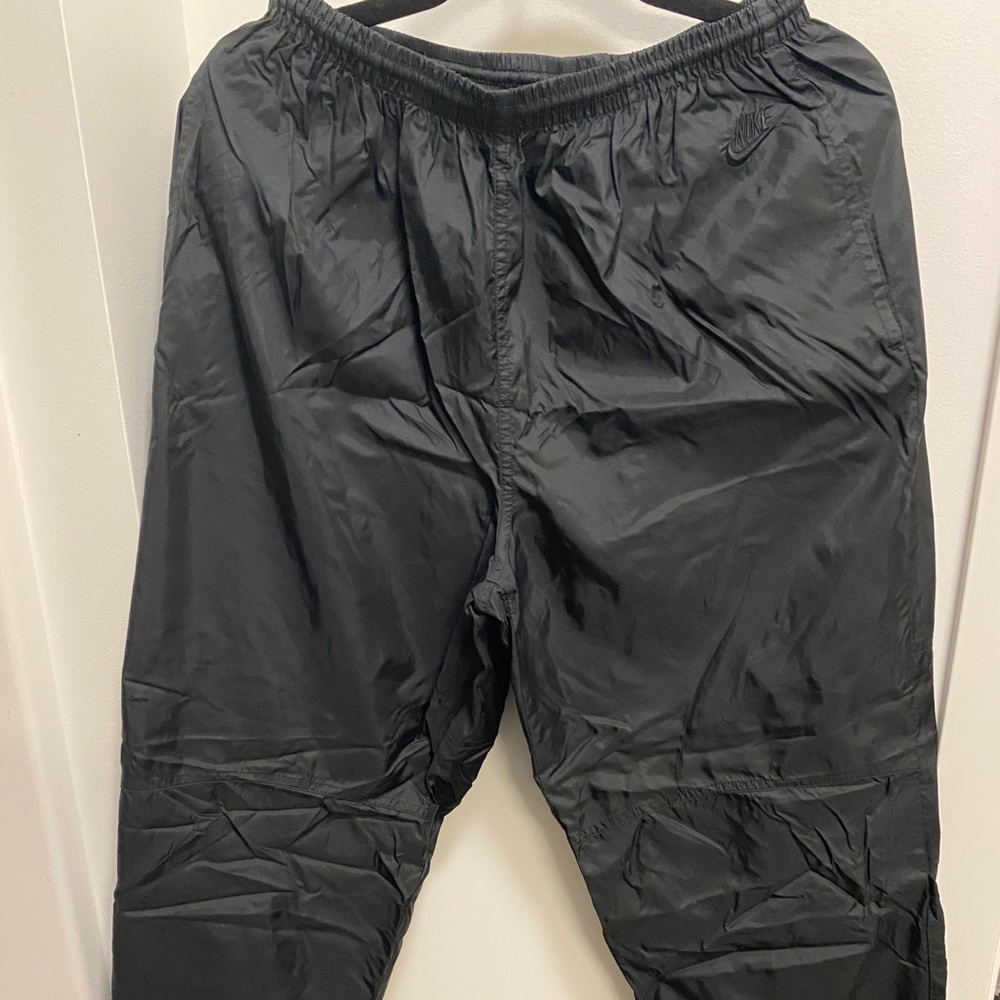 Vintage black Nike wind breaker sweat pants - men, women, unisex size large